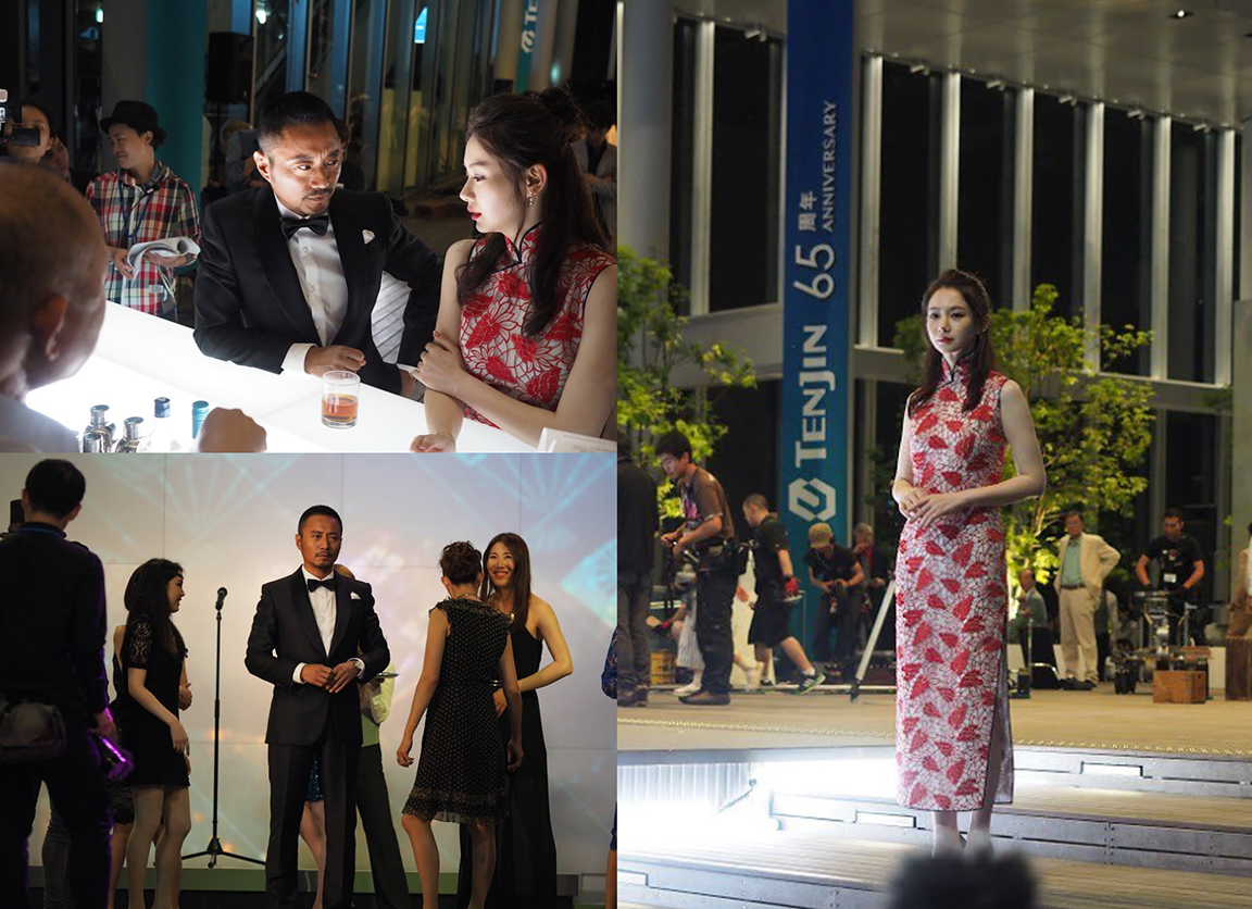 A group of people standing in a room